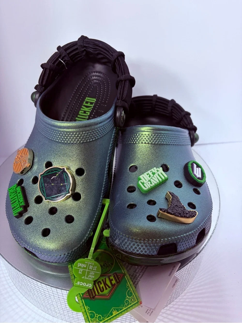 CROCS Kids Iridescent Green Holographic Clogs with Charm Accents